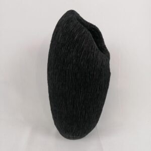 Black resin vase with a coral or textured finish.