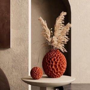 Textured, terracotta-colored decorative vases.